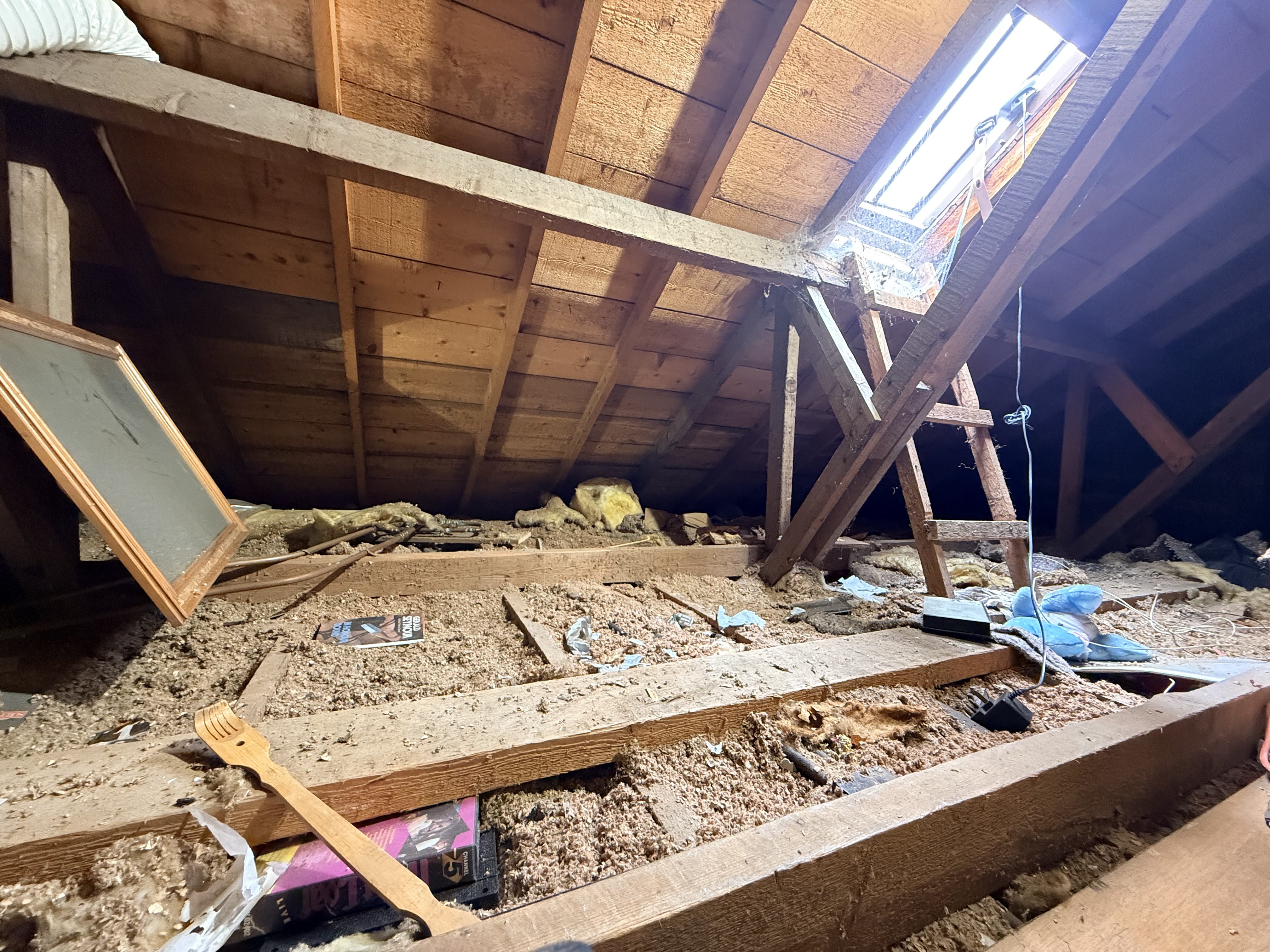 Cleared attic joists ready for floor boarding